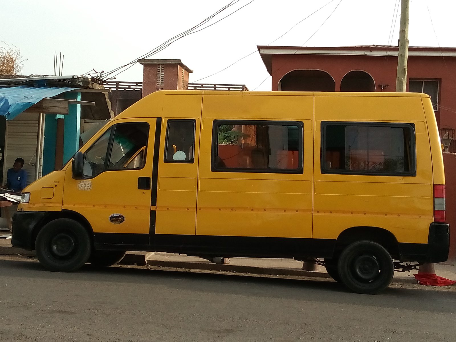 A trotro minibus, Ghana's shared public transport, in use on a street in Ghana